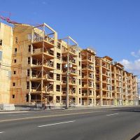 Правительство ускорит подготовку Правил строительства деревянных многоэтажек